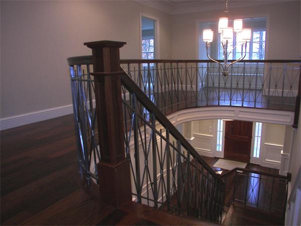 40 Skyview Lane Sudbury, MA 01776 - Photo 18 of 27 a view of entryway and hall with wooden floor