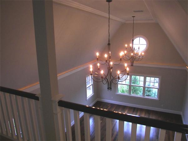 40 Skyview Lane Sudbury, MA 01776 - Photo 19 of 27 a view of a chandelier and window in a room