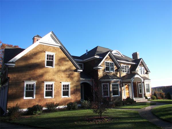 40 Skyview Lane Sudbury, MA 01776 - Photo 3 of 27 a front view of a house with a yard