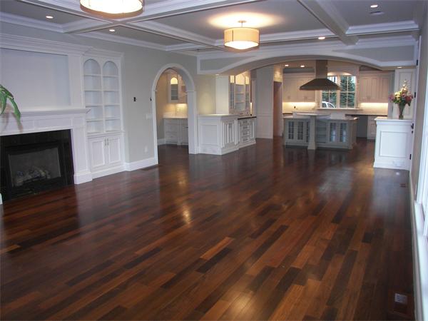 40 Skyview Lane Sudbury, MA 01776 - Photo 6 of 27 a view of a living room and kitchen with wooden floor