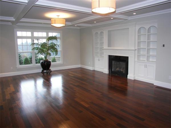 40 Skyview Lane Sudbury, MA 01776 - Photo 8 of 27 a view of a living room with wooden floor and a fireplace