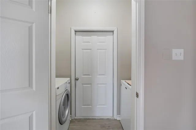 a view of a bathroom with washing machine