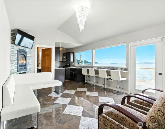 a room with furniture and a large window