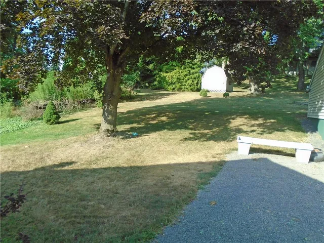 a view of a backyard with a garden