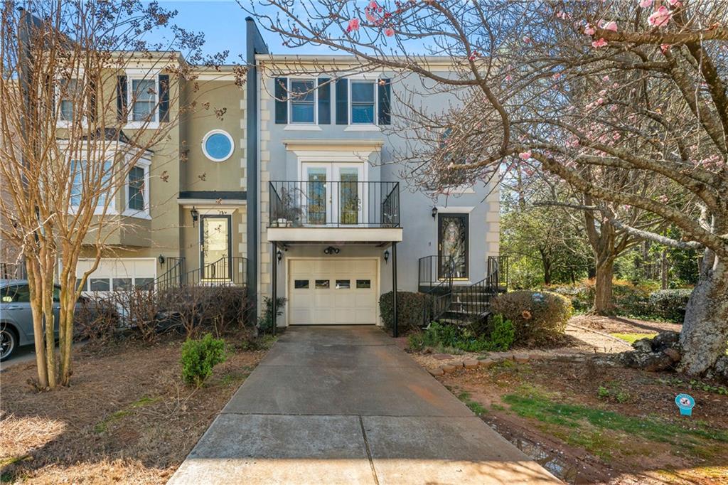7 Sycamore Station Decatur, GA 30030 - Photo 1 of 1 a front view of a building with garden