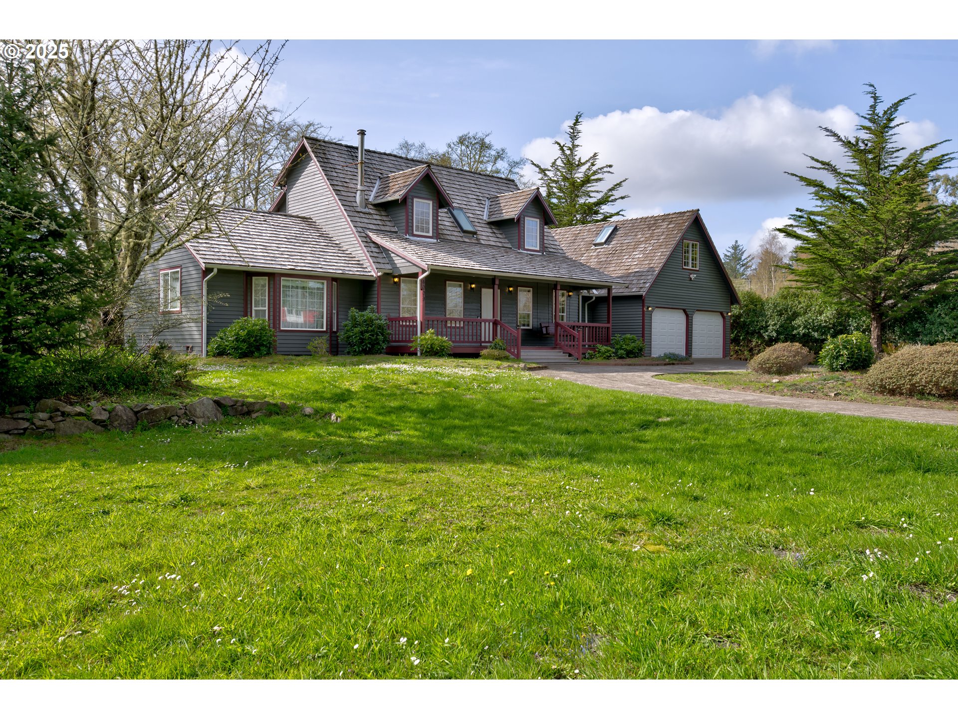 34009 Territory Road Oysterville, WA 98641 - Photo 2 of 39 a view of a house with a big yard