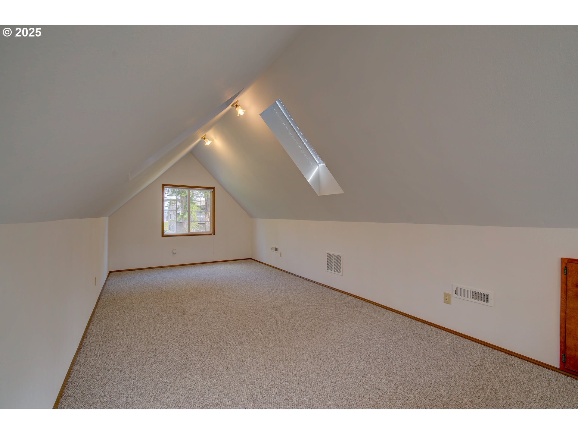34009 Territory Road Oysterville, WA 98641 - Photo 36 of 39 a view of an empty room with a window