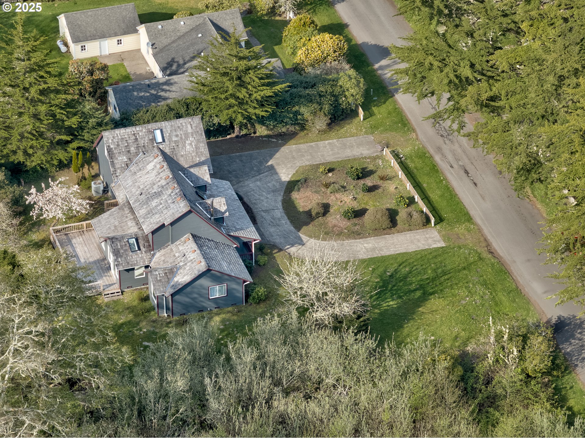 34009 Territory Road Oysterville, WA 98641 - Photo 38 of 39 an aerial view of a house with a yard