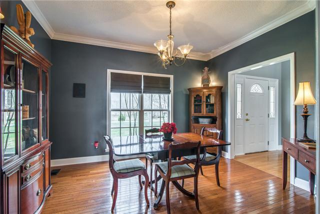 247 Eastside Road Burns, TN 37029 - Photo 12 of 19 Formal Dining Room w/ Hardwood & Crown Molding