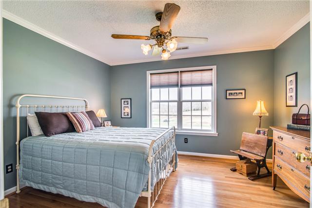 247 Eastside Road Burns, TN 37029 - Photo 15 of 19 Spacious Guest Bedrooms w/ Hardwood Floors