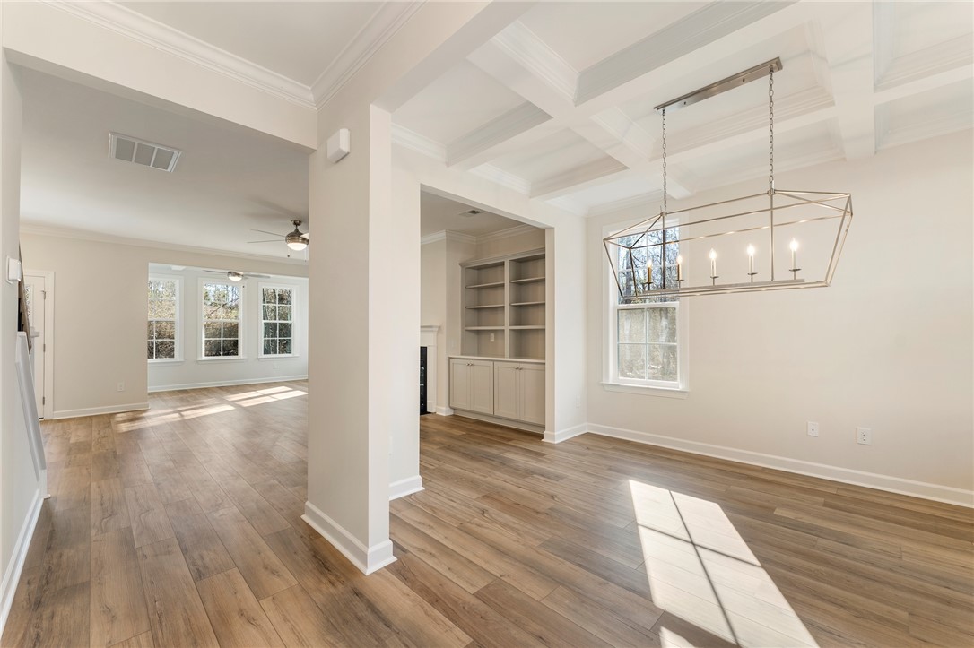 707 Weathered Oak Way Anderson, SC 29621 - Photo 2 of 28 This bright interior features built-in shelving, hardwood flooring, and abundant natural light.