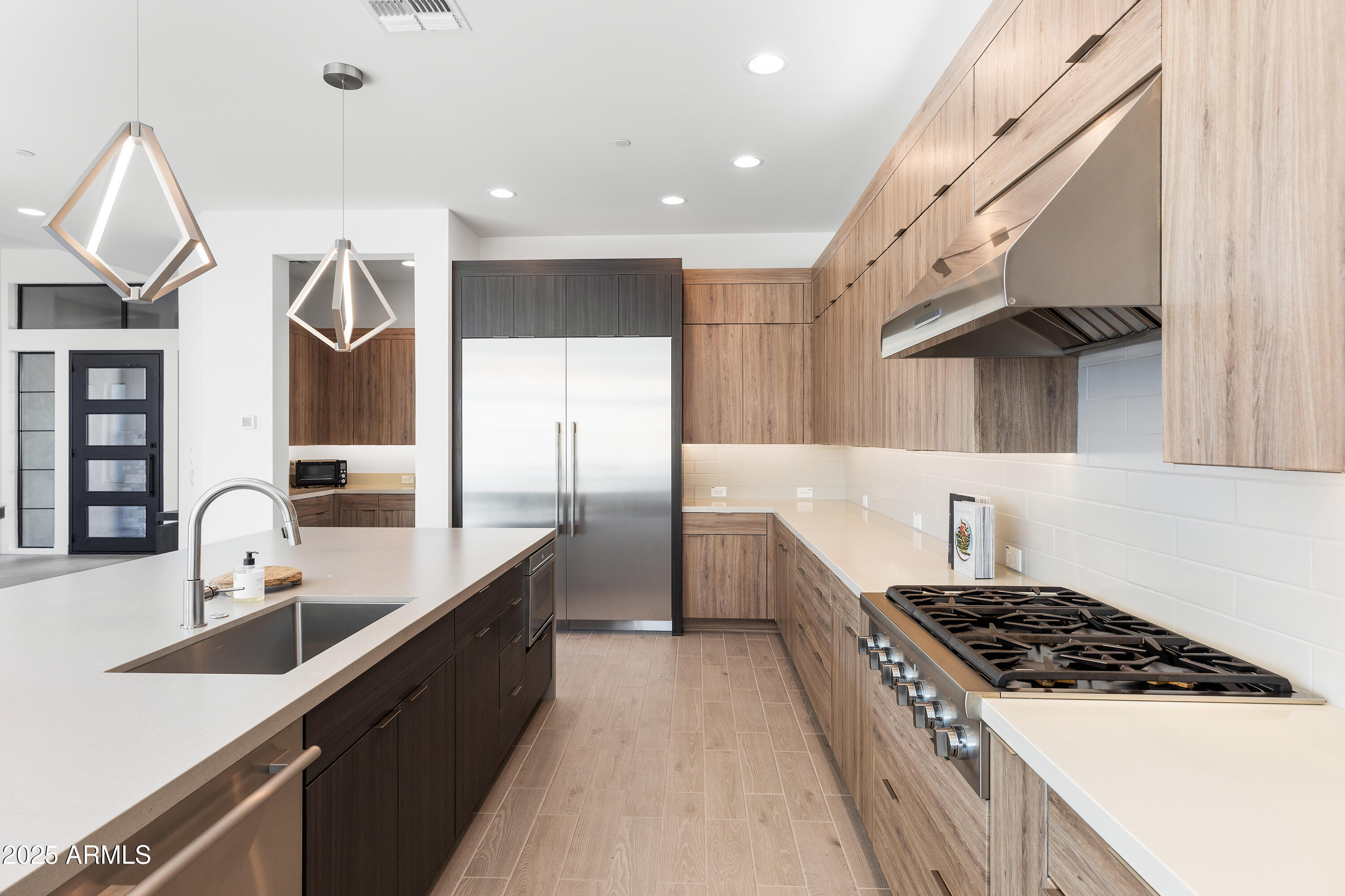 13238 East Ranch Gate Road Scottsdale, AZ 85255 - Photo 13 of 66 a kitchen with granite countertop a sink stainless steel appliances and cabinets