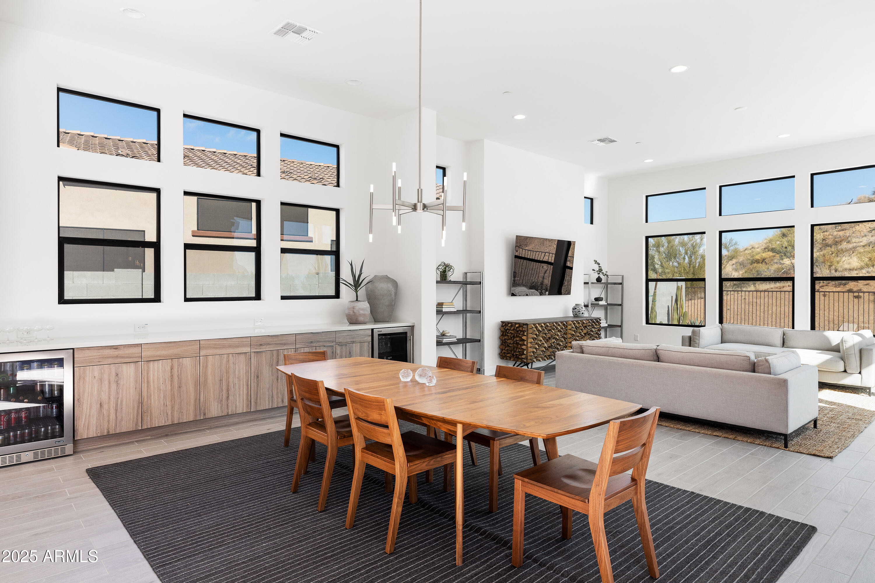 13238 East Ranch Gate Road Scottsdale, AZ 85255 - Photo 17 of 66 a view of a dining room with furniture and wooden floor