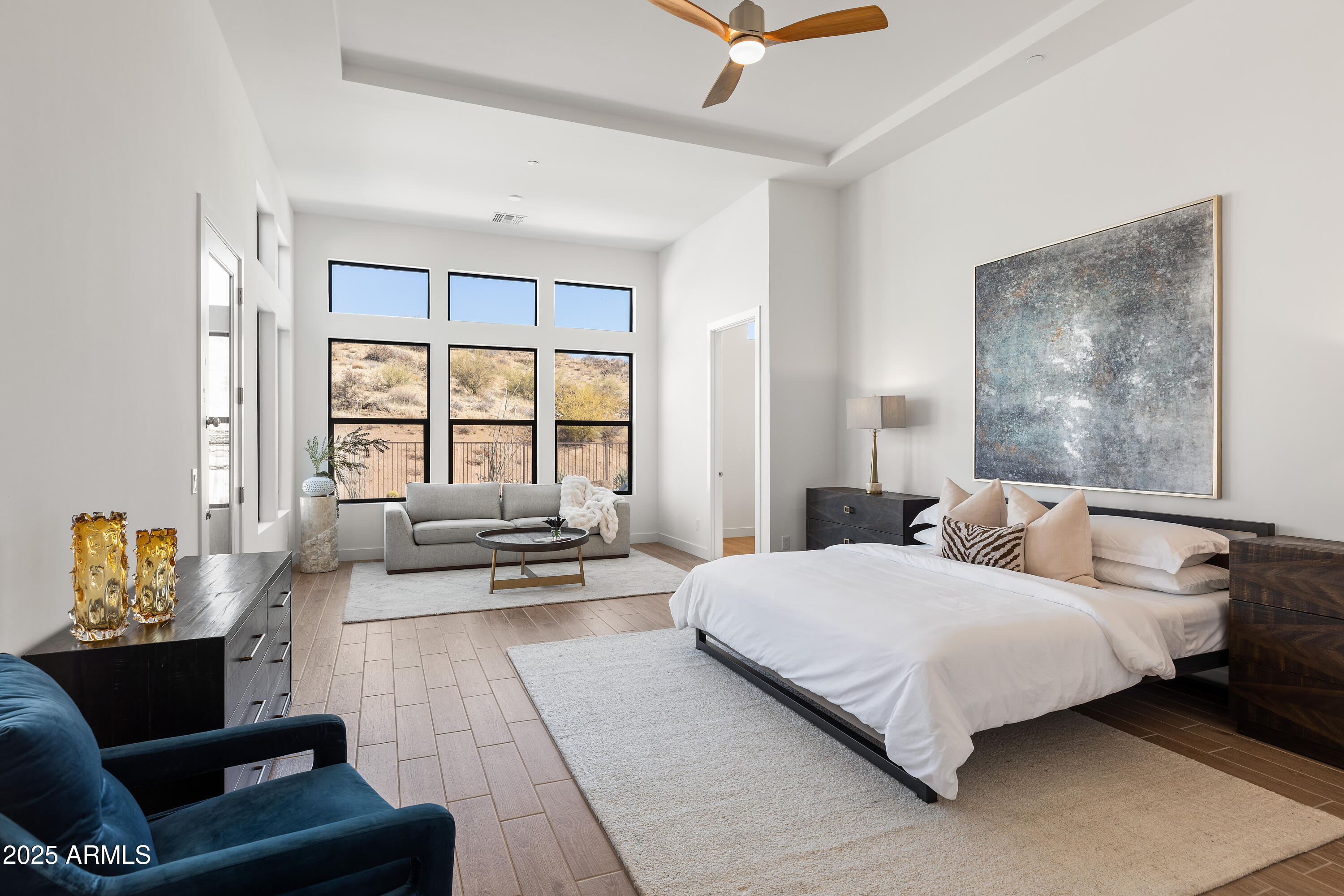 13238 East Ranch Gate Road Scottsdale, AZ 85255 - Photo 25 of 66 a bedroom with a bed couch and a window