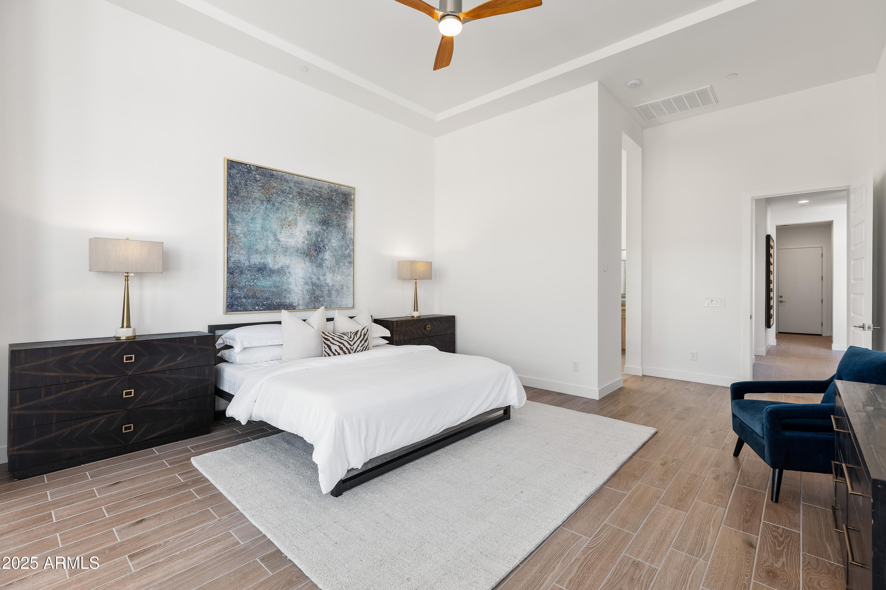 13238 East Ranch Gate Road Scottsdale, AZ 85255 - Photo 26 of 66 a bedroom with a bed and a table