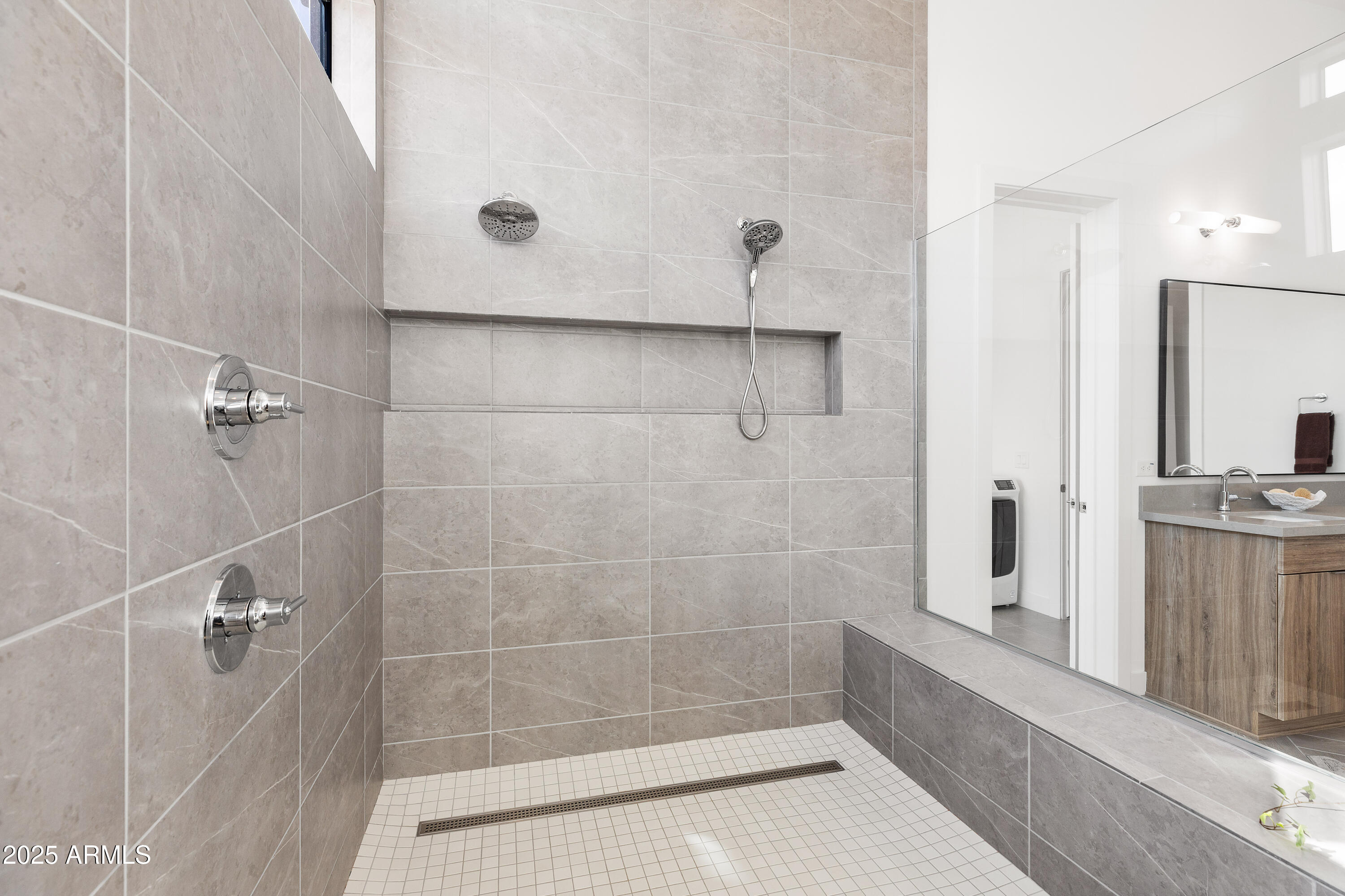 13238 East Ranch Gate Road Scottsdale, AZ 85255 - Photo 31 of 66 a bathroom with a bathtub and a shower