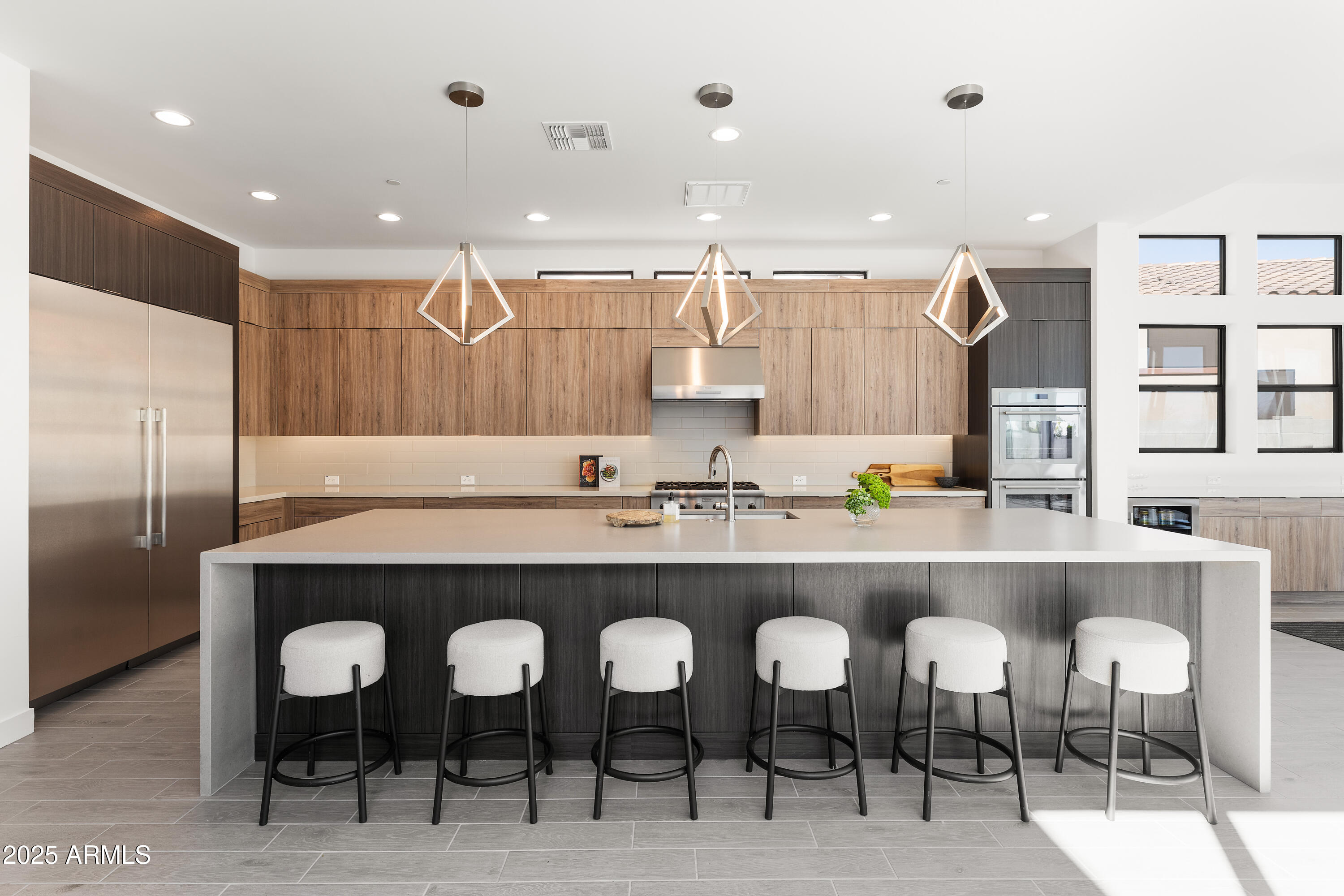 13238 East Ranch Gate Road Scottsdale, AZ 85255 - Photo 3 of 66 a large kitchen with a table and chairs