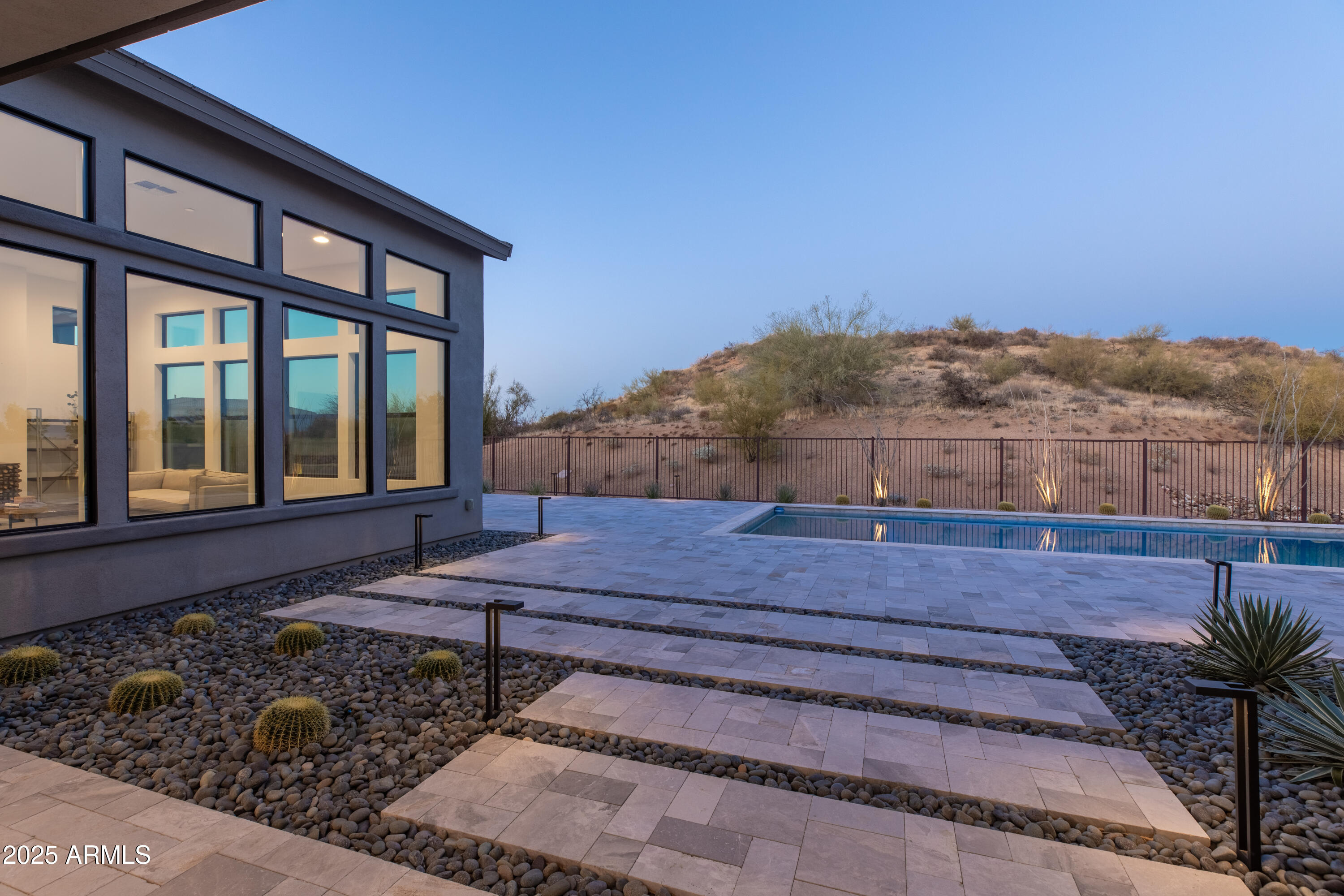 13238 East Ranch Gate Road Scottsdale, AZ 85255 - Photo 50 of 66 a wooden bench sitting in front of a building