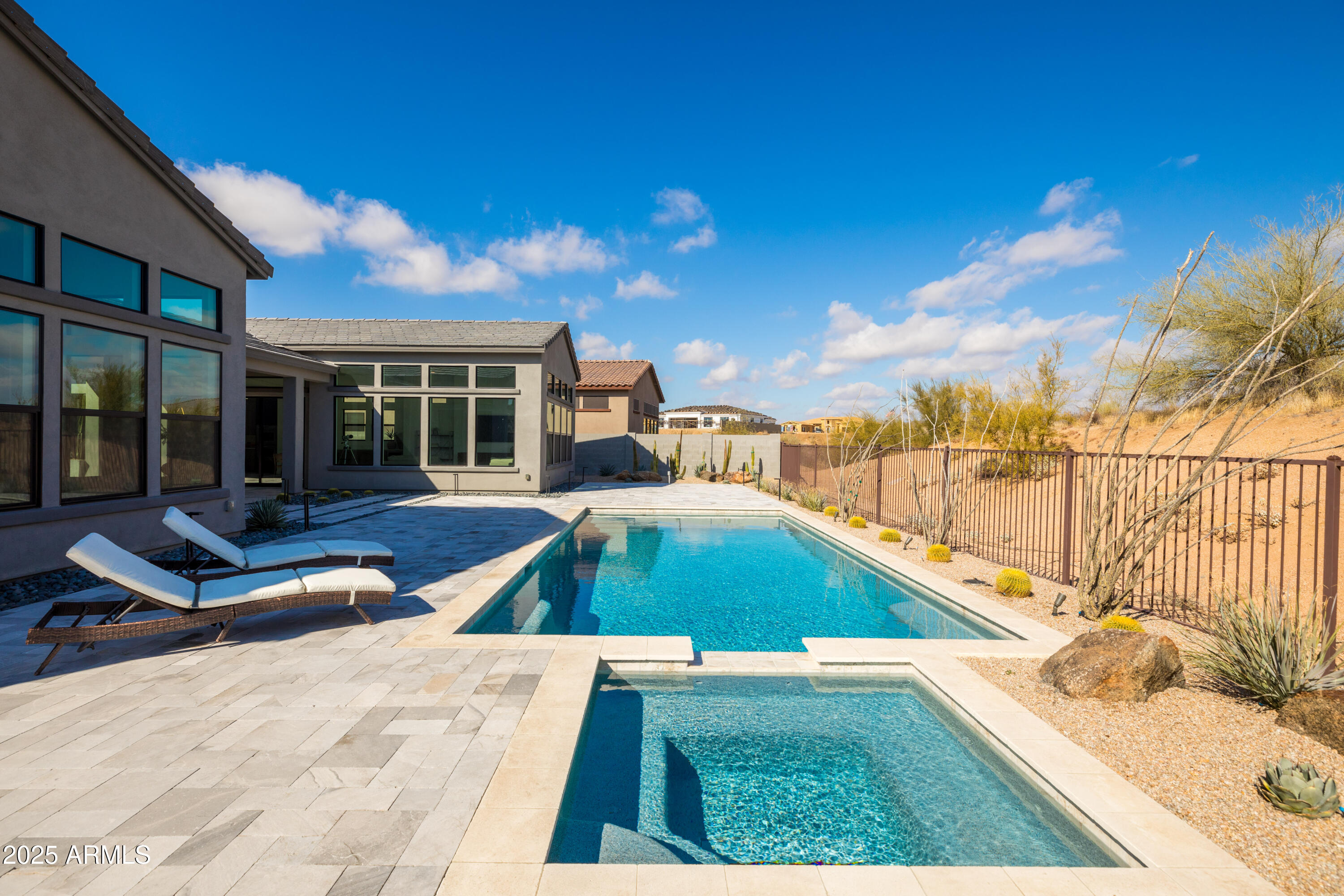 13238 East Ranch Gate Road Scottsdale, AZ 85255 - Photo 55 of 66 a view of a house with swimming pool and sitting area