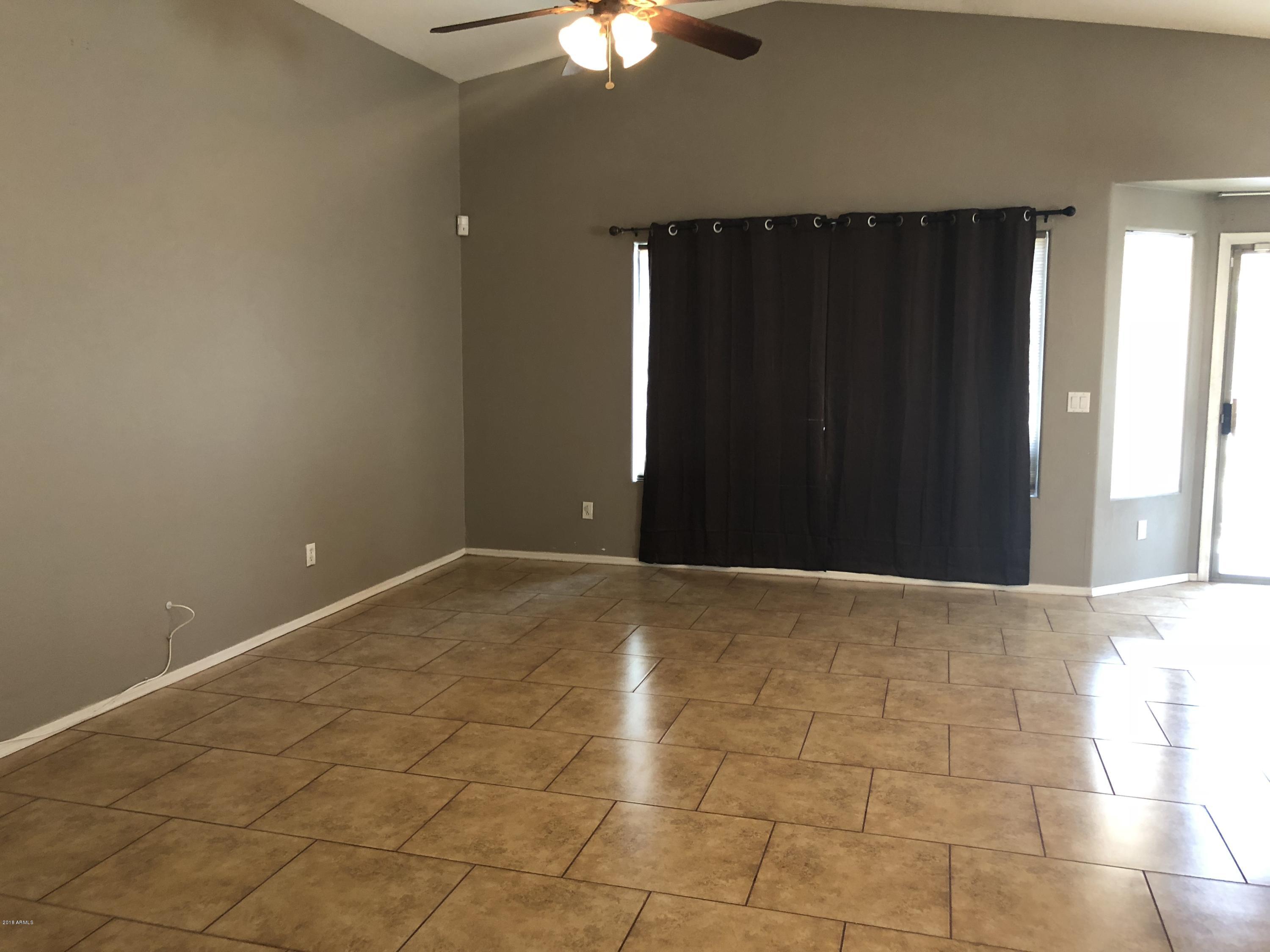 2321 West Maldonado Road Phoenix, AZ 85041 - Photo 14 of 44 a view of an empty room