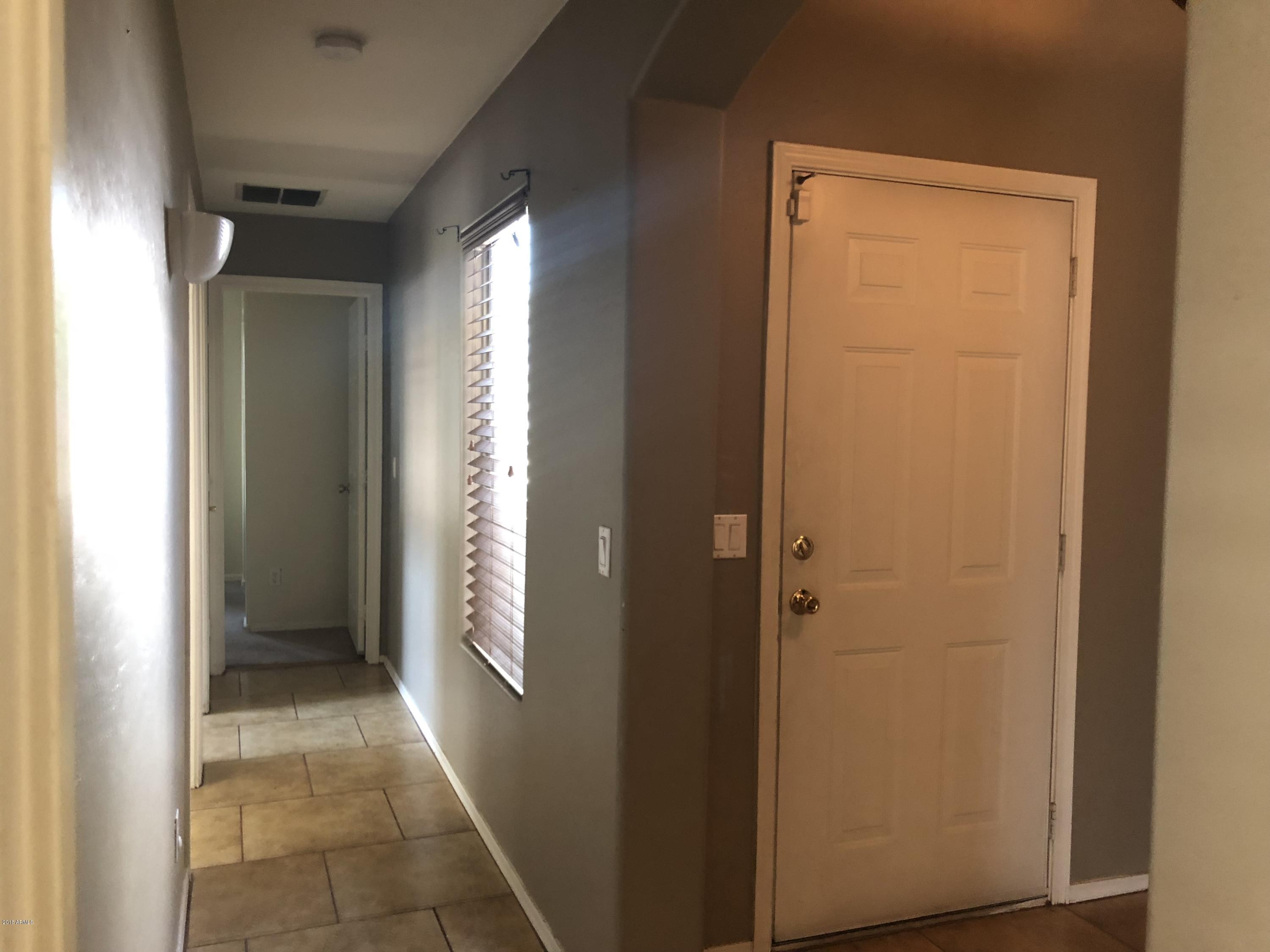2321 West Maldonado Road Phoenix, AZ 85041 - Photo 19 of 44 a view of an empty room