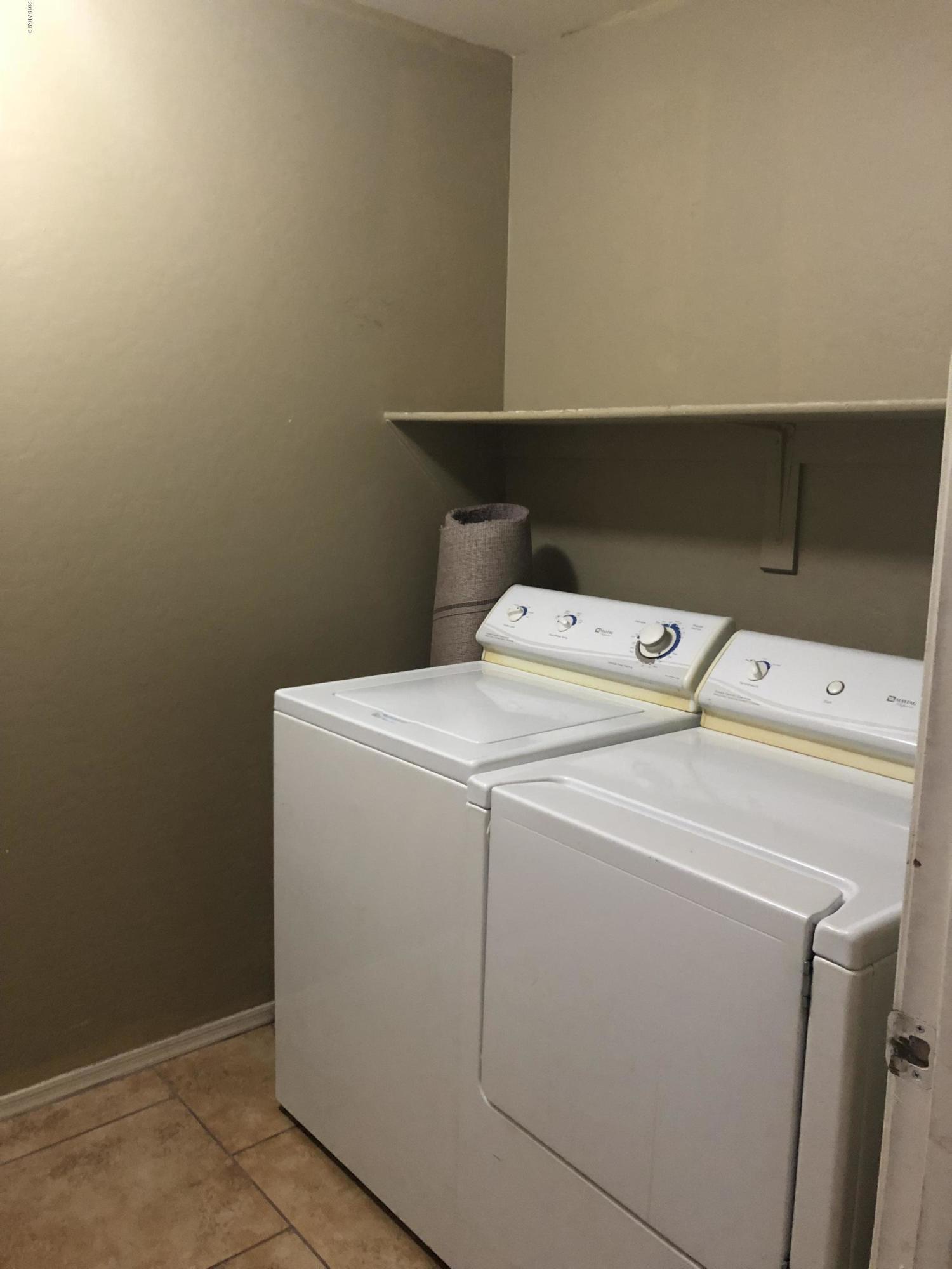 2321 West Maldonado Road Phoenix, AZ 85041 - Photo 25 of 44 a utility room with dryer and washer