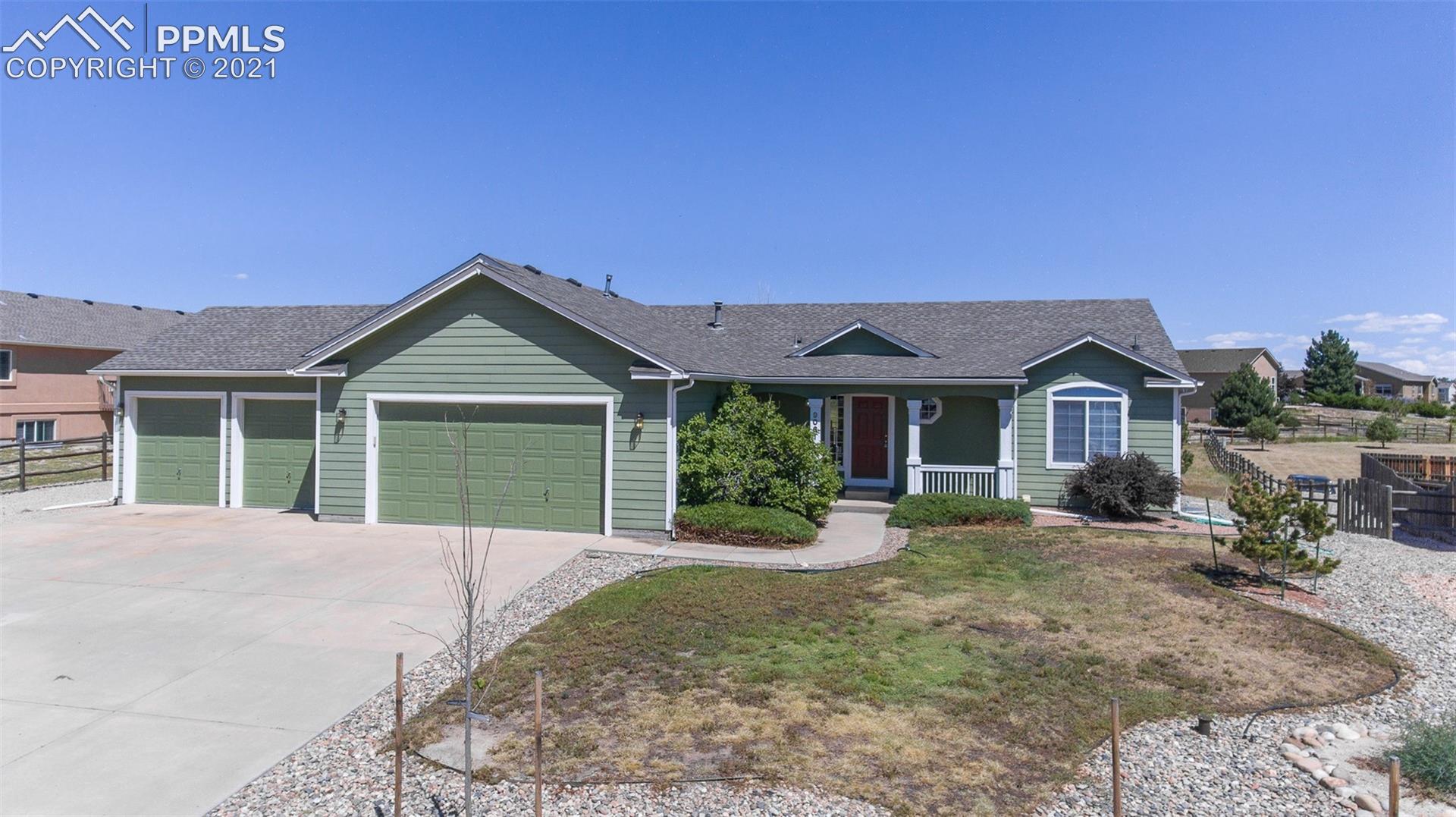 9061 Tompkins Road Peyton, CO 80831 - Photo 1 of 27 4 car!