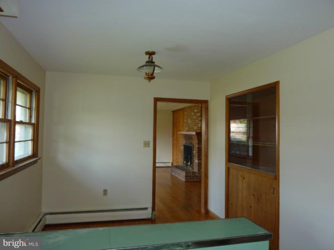404 Beechcroft Road Winchester, VA 22601 - Photo 11 of 21 Kitchen Dining Area w/ built-in China Cabinet