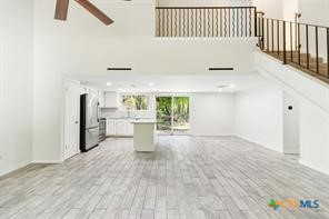 12011 Scribe Drive Austin, TX 78759 - Photo 6 of 14 a view of kitchen with furniture and a window