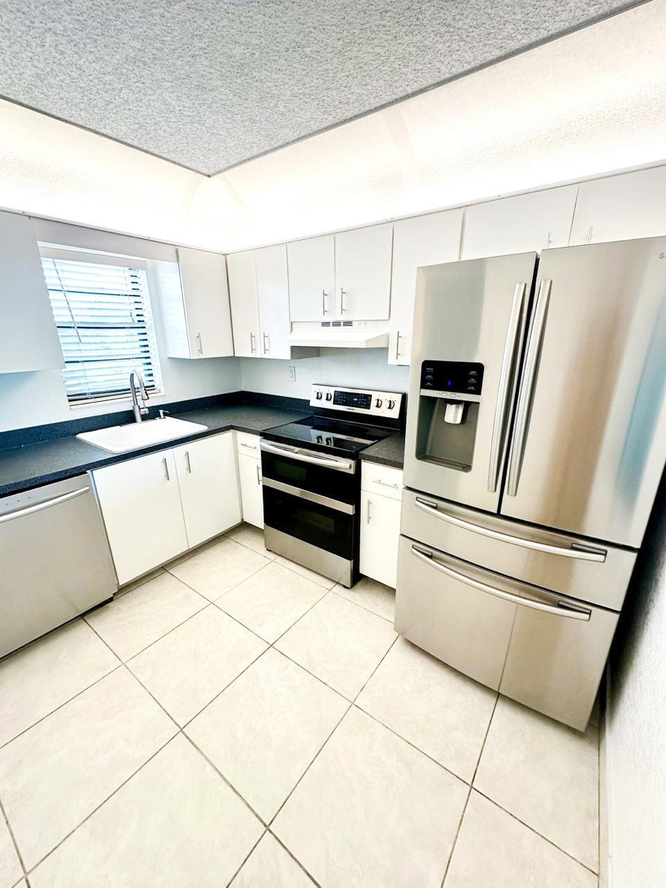 9235 Southwest 8th Street, Unit 402 Boca Raton, FL 33428 - Photo 11 of 37 c37dd6b3-c79d-4705-88bb-01e0fd8abc91