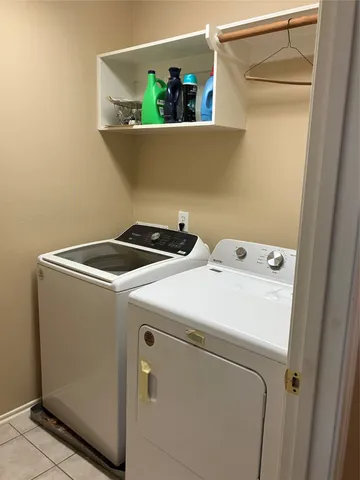 a bathroom with a bathtub and a toilet