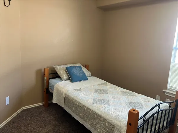 a view of a small space with racks on the wall