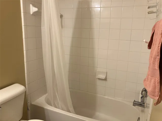 a view of a small space with racks on the wall