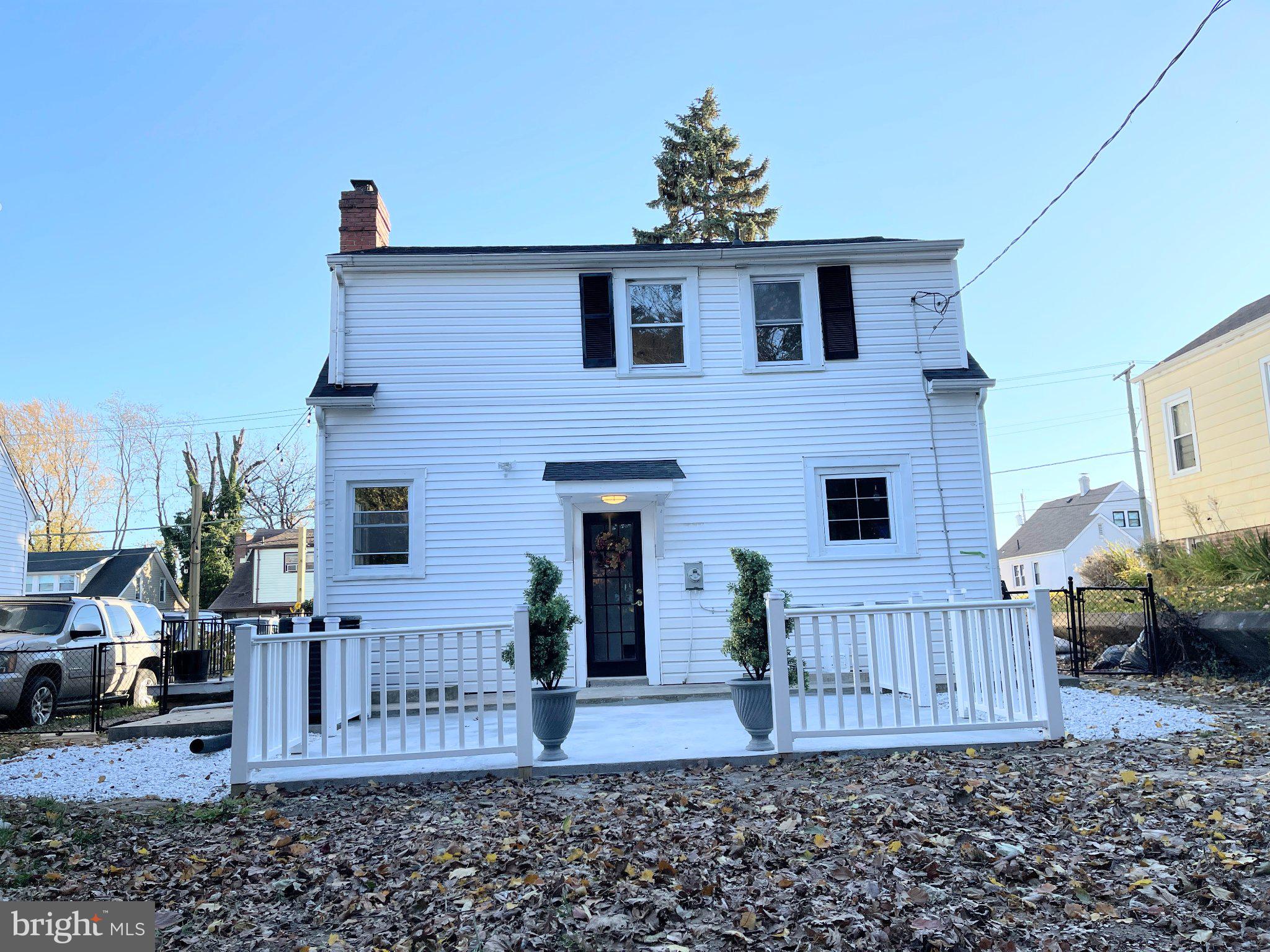 3712 West Cold Spring Lane Baltimore, MD 21215 - Photo 2 of 39 Charming white home with welcoming porch.