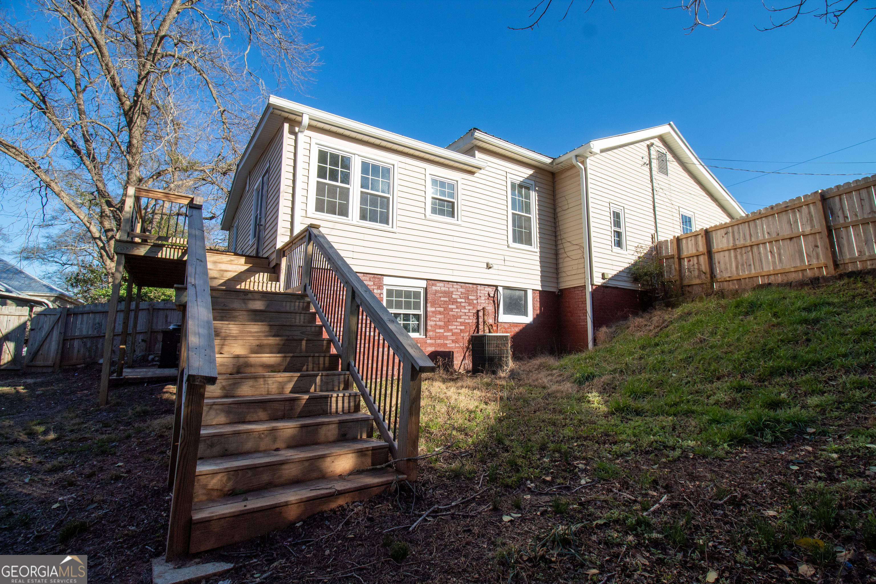 2 Wilson Street Manchester, GA 31816 - Photo 11 of 13 a view of a house with backyard and trees