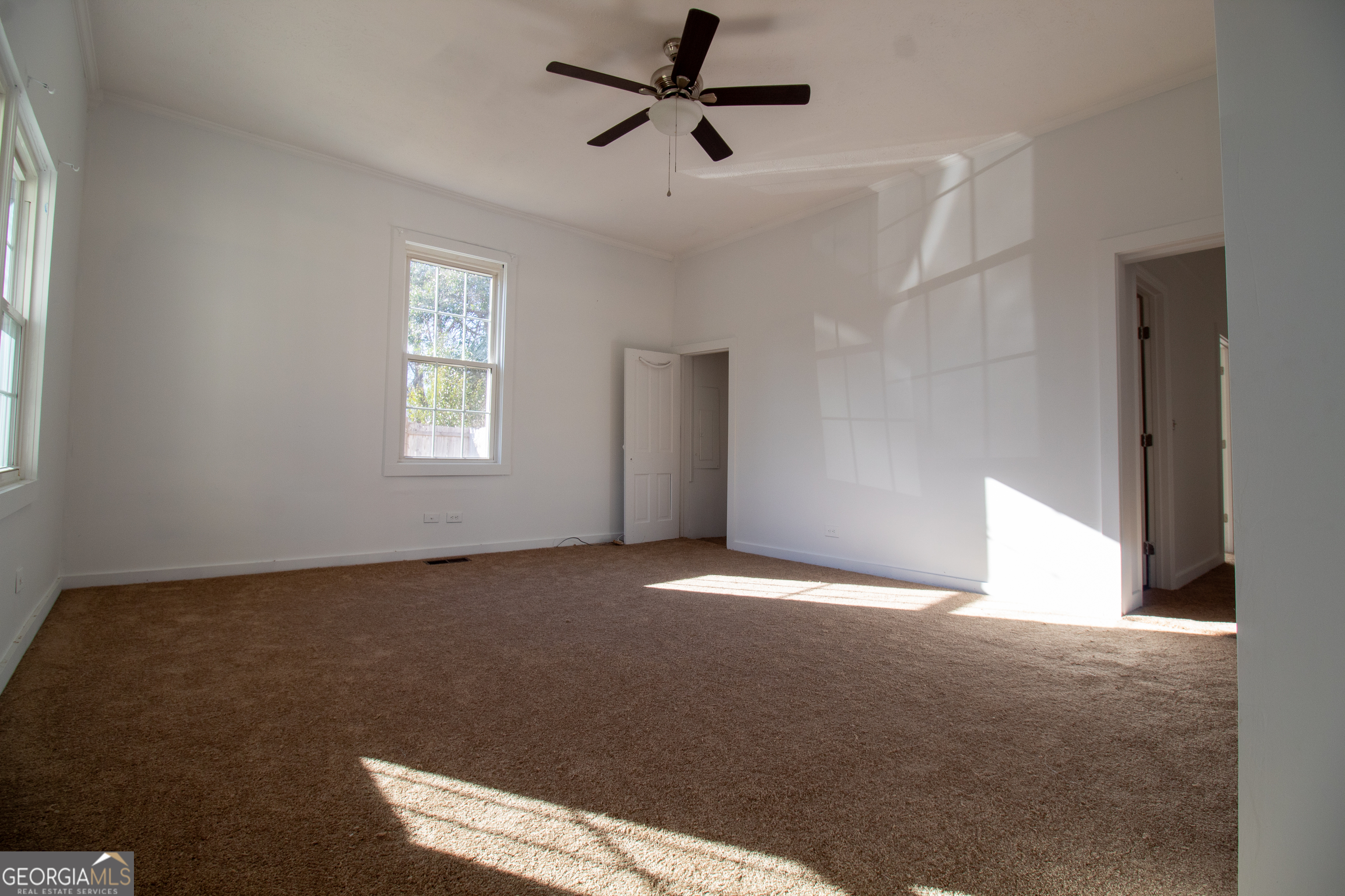 2 Wilson Street Manchester, GA 31816 - Photo 6 of 13 a view of an empty room with a window