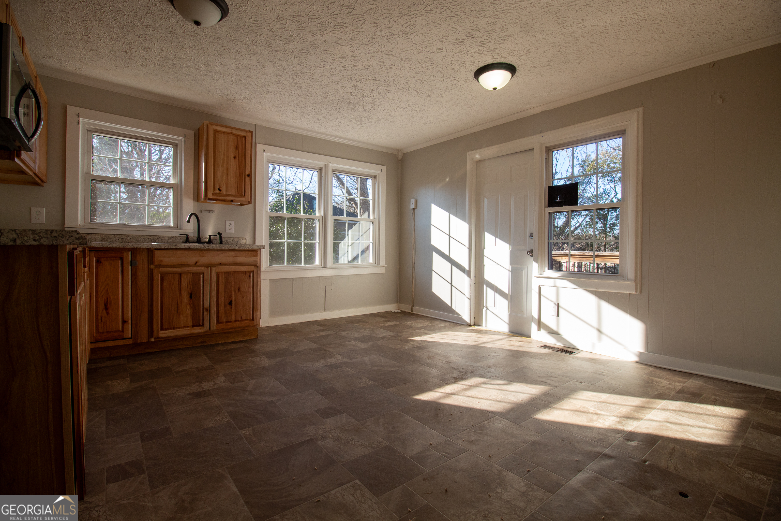 2 Wilson Street Manchester, GA 31816 - Photo 7 of 13 a view of an empty room with a window