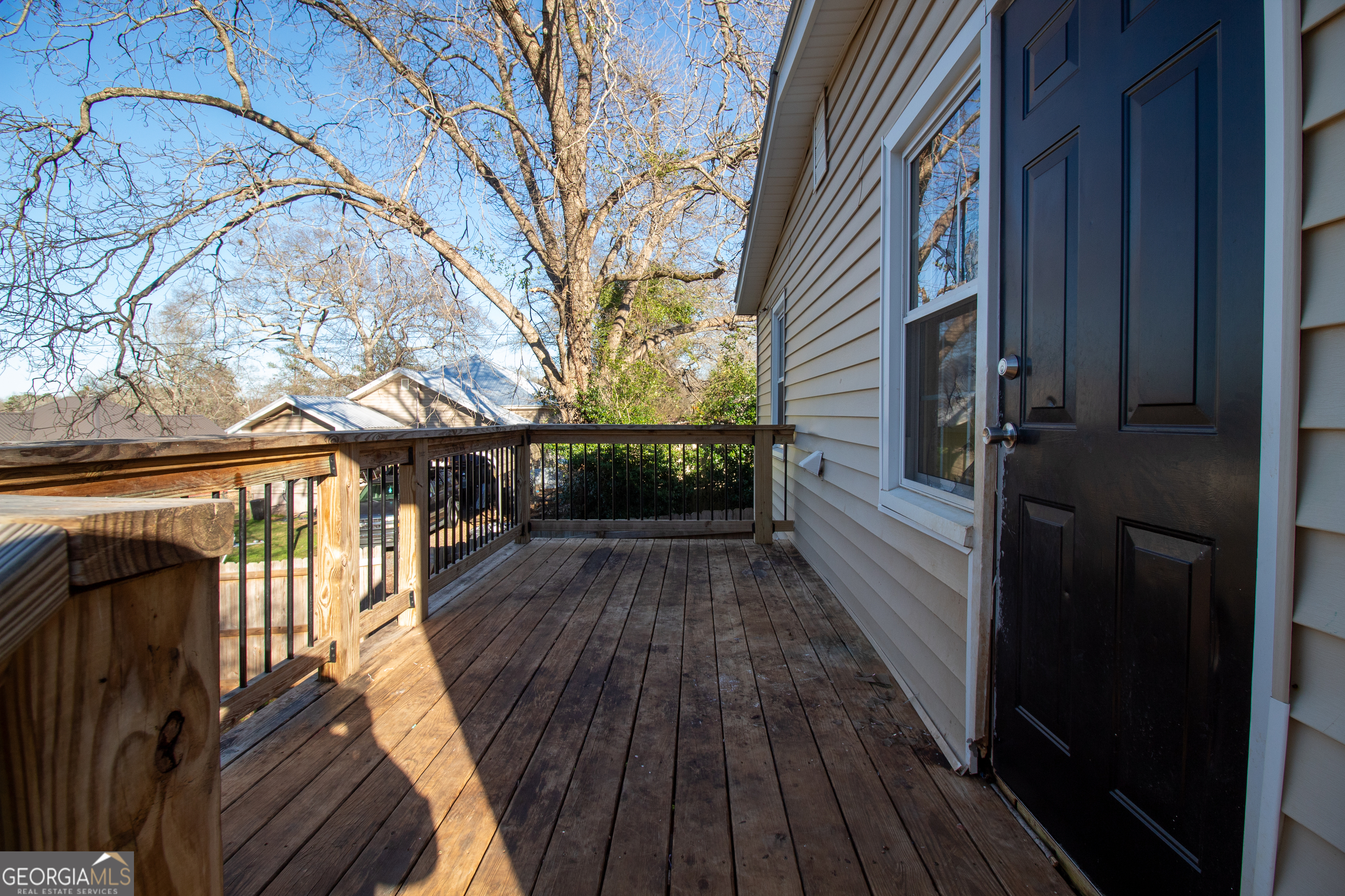 2 Wilson Street Manchester, GA 31816 - Photo 9 of 13 a view of balcony with wooden floor