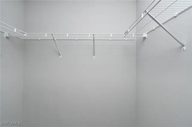 a view of a room with racks on the wall