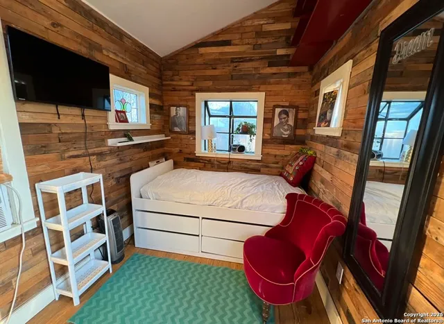 a picture of a room with a white wall and white picture