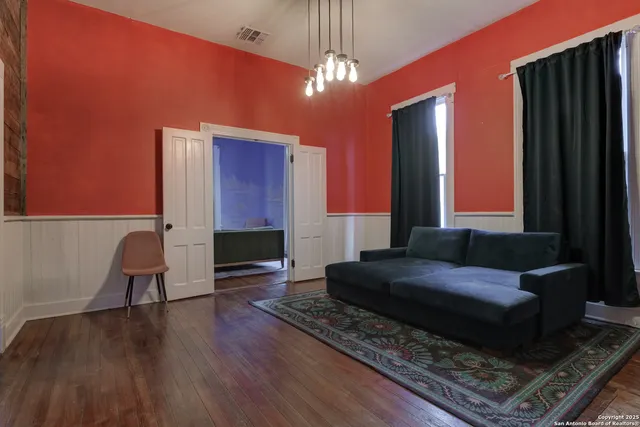 a kitchen with a refrigerator and a stove