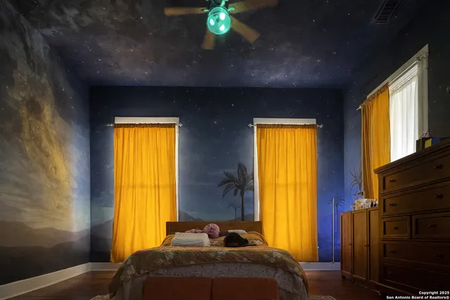 a kitchen with stainless steel appliances granite countertop a stove and a refrigerator