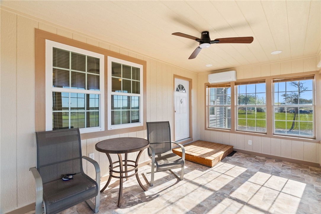 4752 Homestead Lane Robstown, TX 78380 - Photo 13 of 22 a living room with furniture and a large window