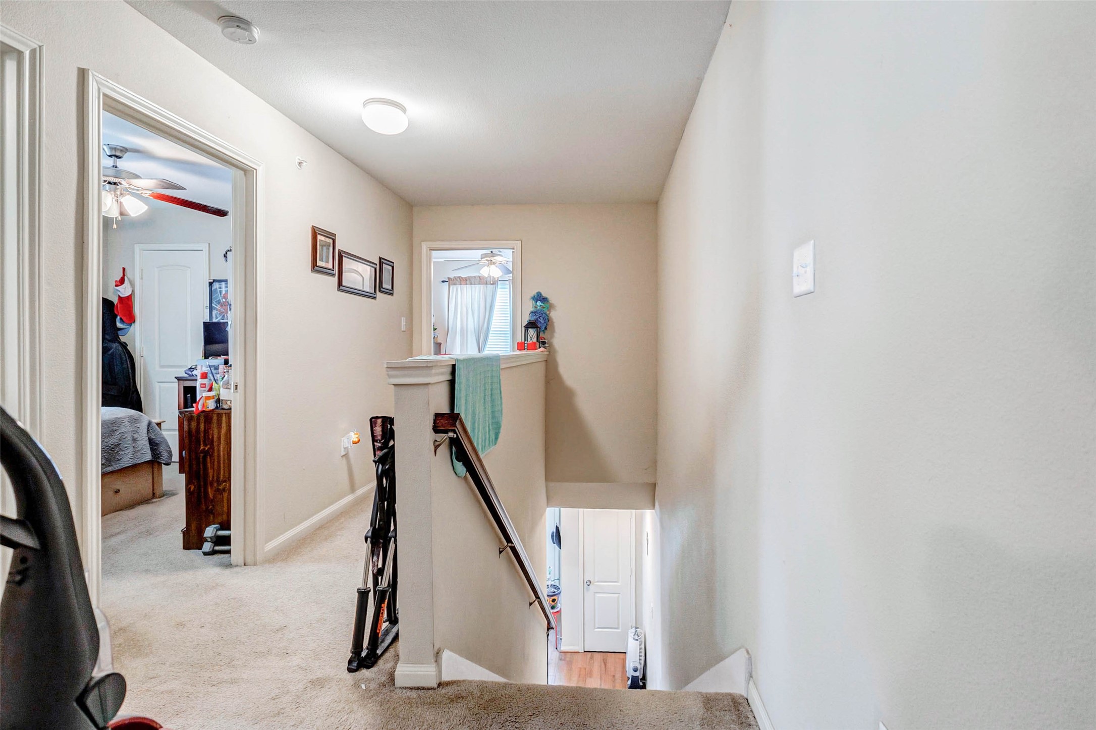 1702 Doyle Court, Unit 2 Pasadena, TX 77503 - Photo 19 of 30 a view of a hallway with windows