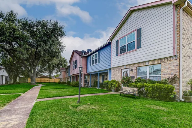 a house view with a garden space