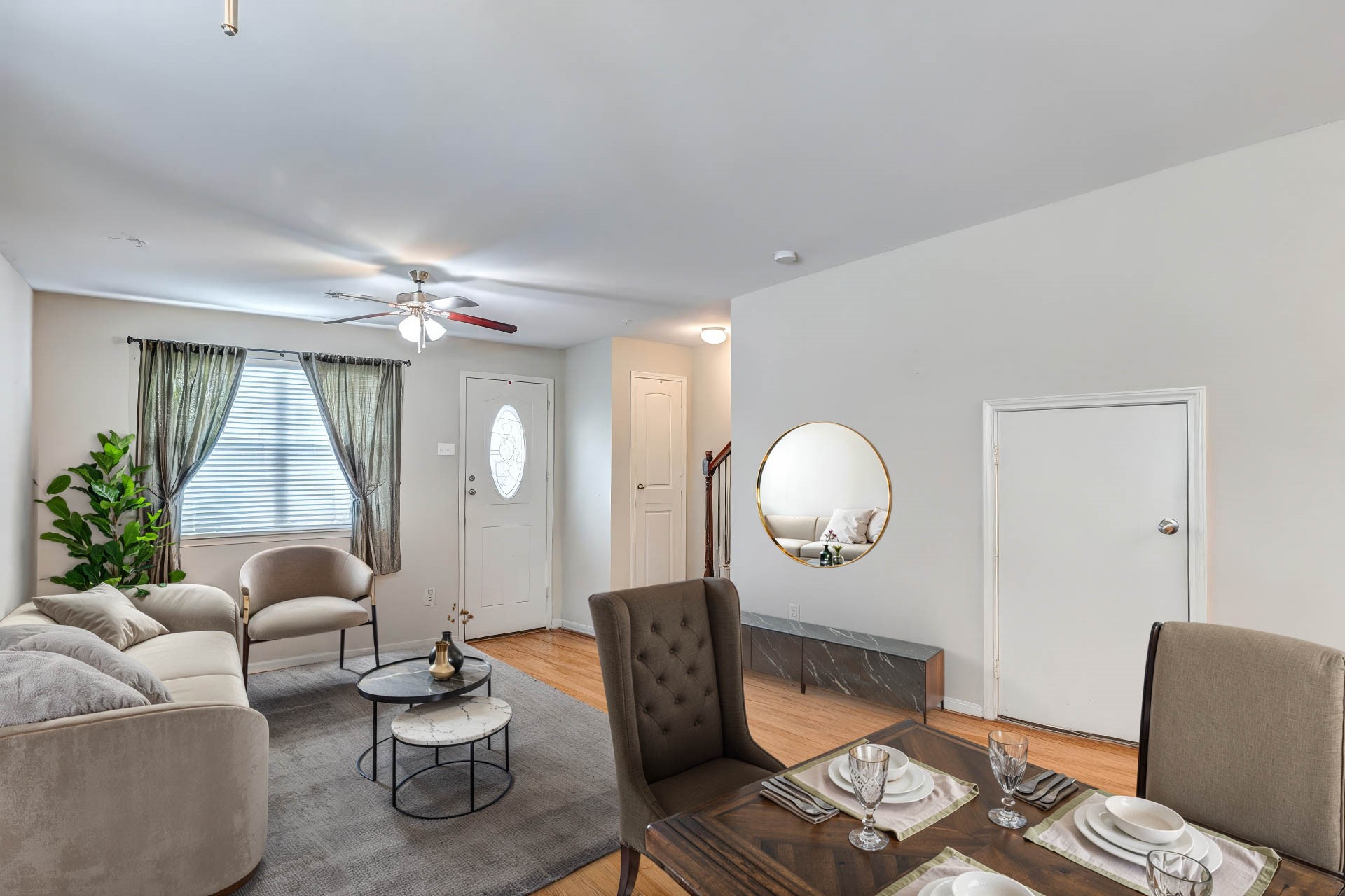 1702 Doyle Court, Unit 2 Pasadena, TX 77503 - Photo 5 of 30 a living room with furniture a lamp and a large mirror
