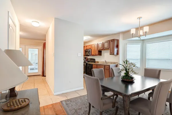 a view of a dining room with furniture