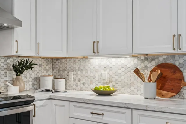 a bathroom with a tub and shower