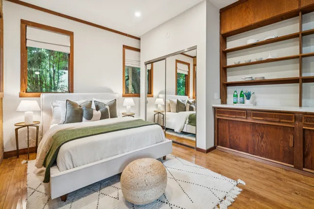 a living room with furniture and a swimming pool