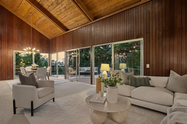 a front view of house with yard and outdoor seating